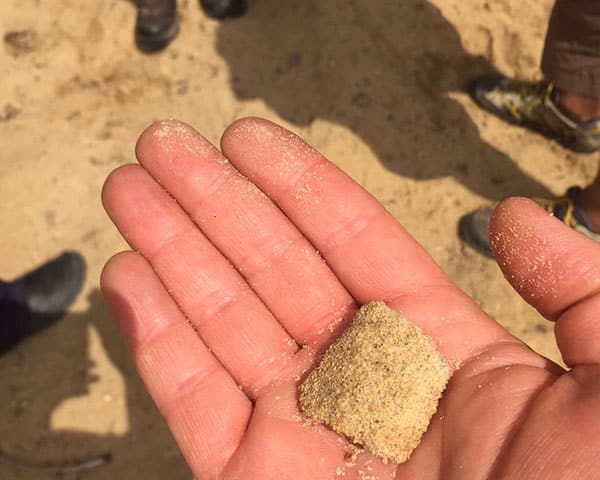 Fine Frac Sand in hand